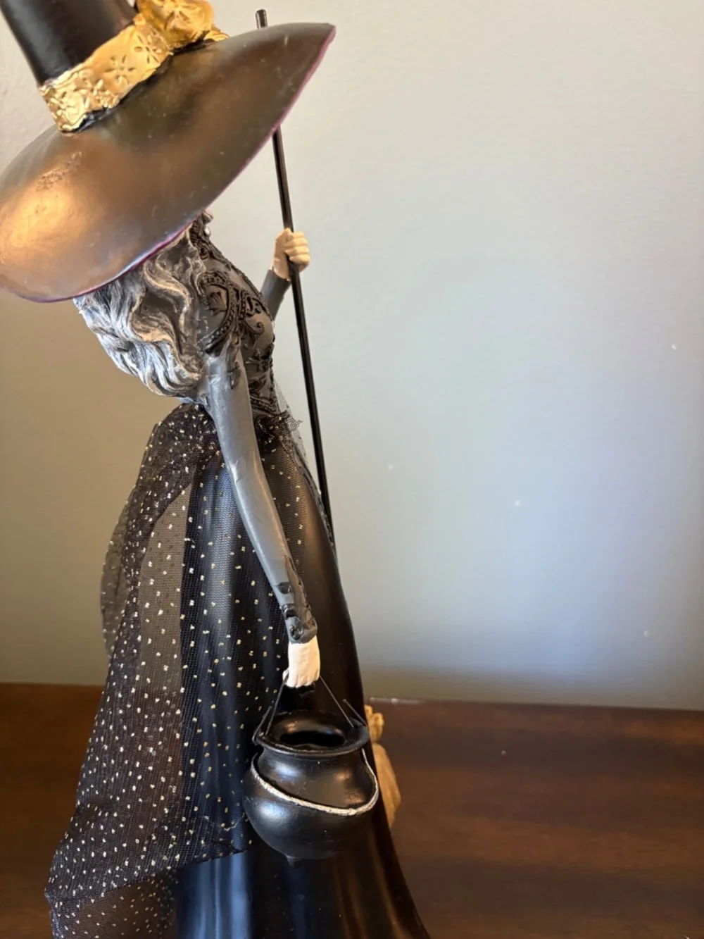 Elegant Black Witch Figurine with Purple Hat - Home Accents